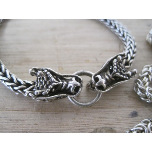 67 - A silver 925 silver rope neck chain 70cm and a similar double headed dragon bracelet total weight 90... 