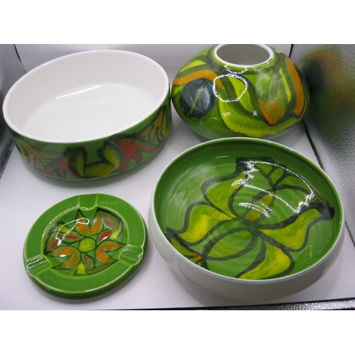 100 - Four pieces of Delphis by Poole Pottery an 8 inch bowl ,Onion vase ,another smaller bowl and an asht... 