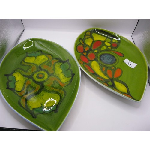 102 - Two Poole Pottery Shorter spear dishes one painted by Pamela Bevans ,both in mint condition having b... 