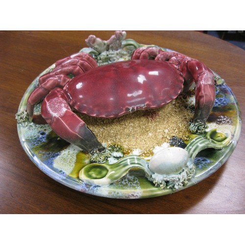 130 - A Lovely majolica Crab dish reminiscent of the seaside complete with sand detail and seashell.