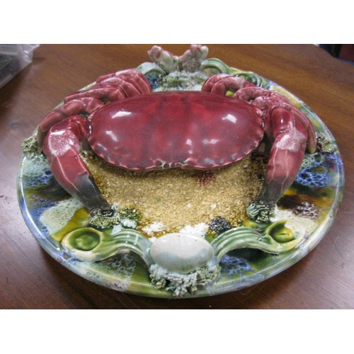 130 - A Lovely majolica Crab dish reminiscent of the seaside complete with sand detail and seashell.