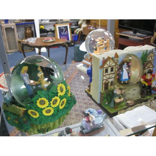 131 - Three Disney musical snowglobes - Pocahontas 'Colors of the Wind' (rotating), Pinocchio 'When you wi... 