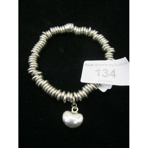 134 - A Links of London style Bracelet unmarked apart from the 925 silver mark.
weight  approx 52 grams