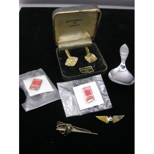 105 - A pair of Diamond cut Cufflinks a tiepin modelled as a Sword a 1953 Caddy spoon and another brooch A... 