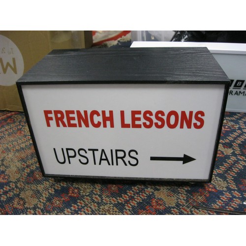 160 - A 'French Lessons Upstairs' light box in good order