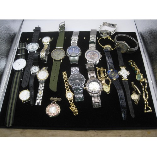 186 - A bag of about twenty ladies and gents quartz wristwatches, a/f all require new batteries at least, ... 