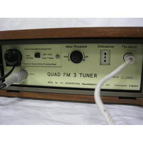 111 - A Quad 303 Power Amplifier, a Quad 33 Control Unit and a Quad Stereo Tuner, the latter two built int... 