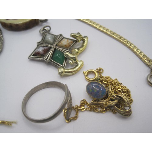 19 - A small quantity of costume jewellery - a gold-plated pendant set with an a/f opal, a polished ameth... 