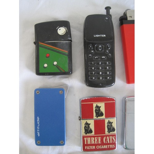 147 - Seven cigarette lighters, (including Champ billiards, Zippo, Coronet Rocky Three Cats, a double-flam... 