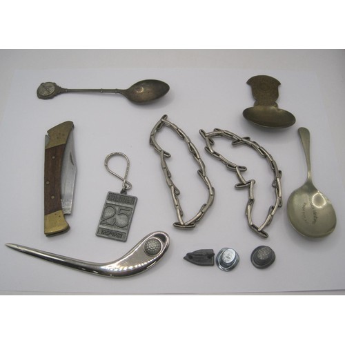 162 - A bag of small items - a pair of Lambournes Birmingham sleeve garters, a clasp knife, two caddy spoo... 