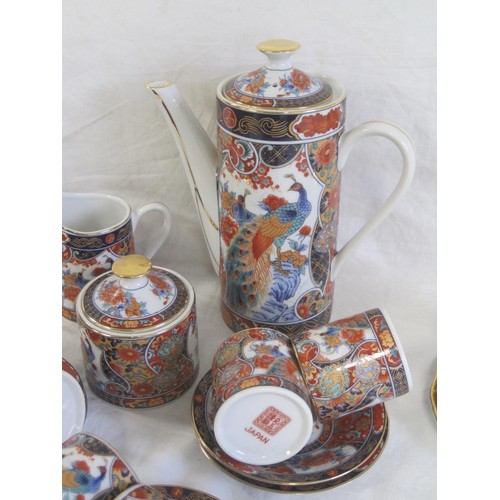 141 - A modern Japanese porcelain coffee set, decorated in traditional style with peacocks and gilding