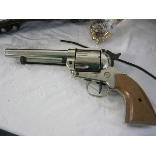 75 - A vintage blank firing pistol in the style of a Colt Peacemaker, by Knall, made in Italy, in a leath... 