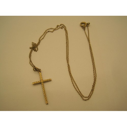 5 - A fine trace yellow metal chain with engraved cross pendant. The pendant hallmarked 9ct gold, Cheste... 