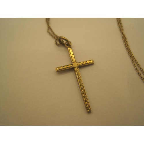 5 - A fine trace yellow metal chain with engraved cross pendant. The pendant hallmarked 9ct gold, Cheste... 