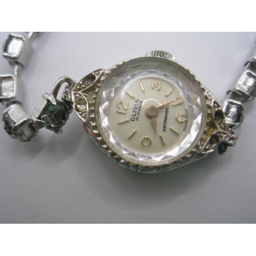 18 - Ladies Olivia cocktail wristwatch, chrome bracelet set with simulated white stones, mechanical Swiss... 