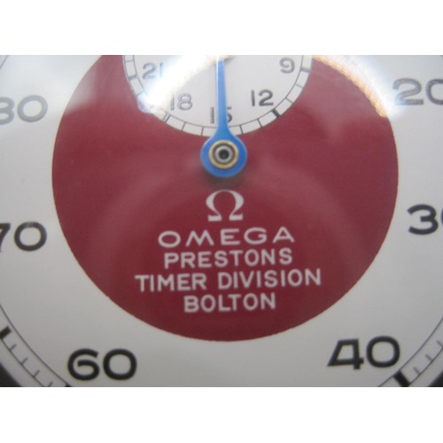 23 - An Omega mechanical stopwatch, the dial marked Omega Prestons Timer Division Bolton. Winds, runs and... 