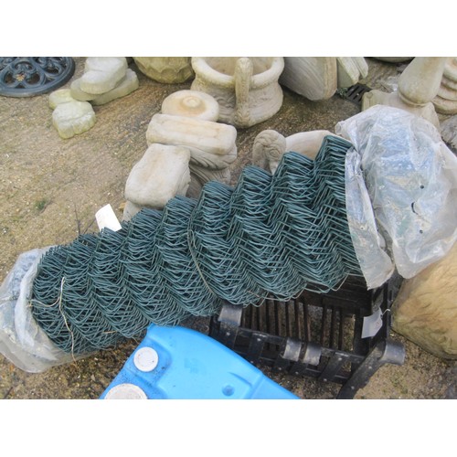 22 - A roll of green plastic covered wire mesh fencing, unused and in good order