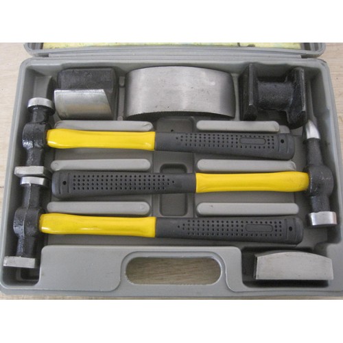 39 - A cased set of hammers and moulds for car body repairs, appears unused