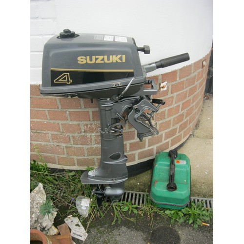 91 - A Suzuki DT4 outboard motor with metal petrol can