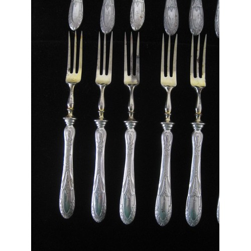 142 - 22 French silver handled knives and forks 11pairs total weight 847 grams including the blades and an... 