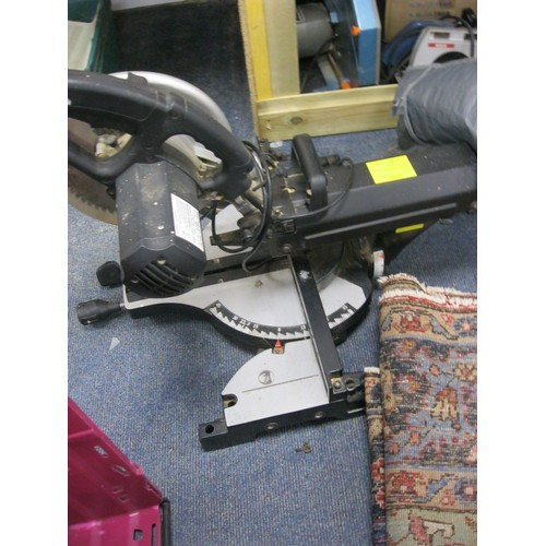 54 - A Wickes brand radial arm 2kW mitre saw with spare blade in good cosmetic condition