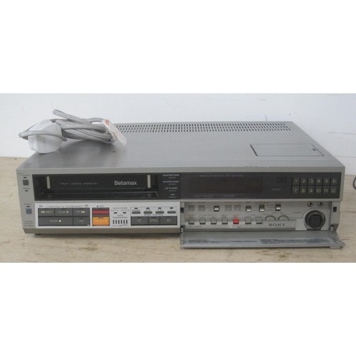 34 - Sony Betamax  video recorder, a pair of speakers, and a cassette recorder. (1) Sony Betamax VCR SL-C... 