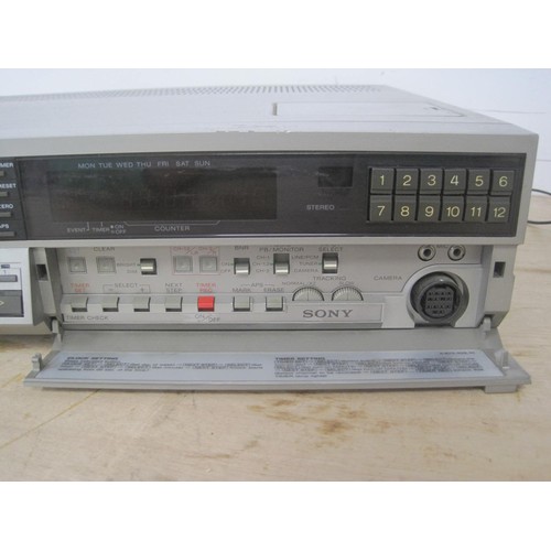 34 - Sony Betamax  video recorder, a pair of speakers, and a cassette recorder. (1) Sony Betamax VCR SL-C... 