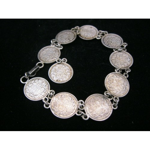 61 - An antique coin bracelet comprising 10 1930s Dutch 10 cent coins featuring Queen Wilhemina, approx w... 