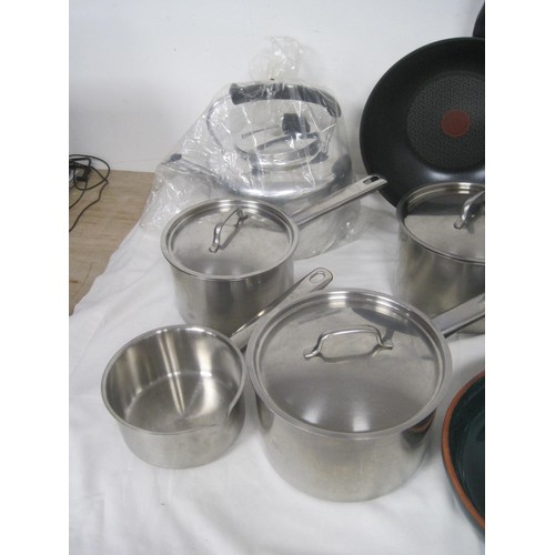 14 - Saucepans, frying pans, an aluminium eight pint kettle, a quiche dish and a pie dish