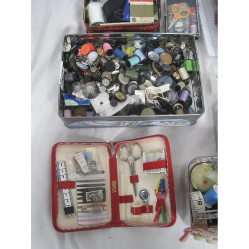 26 - A box of sewing and craft materials, including stitching patterns, threads, etc