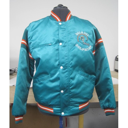 32 - Two American Football Miami Dolphins padded jackets. (1) Chalk Line Made in USA size L Miami Dolphin... 