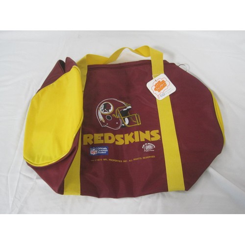 31 - American football jacket and bag - an NFL licensed product Washington Redskins jacket size L labelle... 