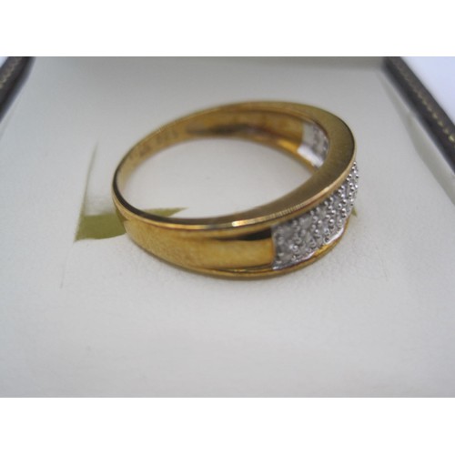 85 - A 9 carat gold ring set with a band of small diamonds, ring size P, approx weight 2.84g