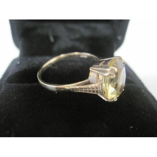 98 - A boxed mid-century 9 carat gold ring set with an oval mixed-cut citrine, ring size O, approx weight... 