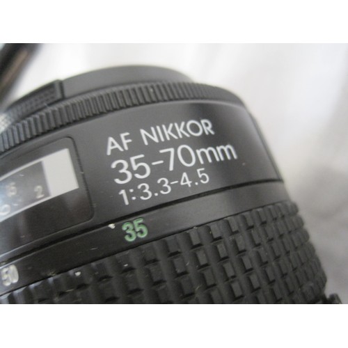 73 - A Nikon AF F-401 35mm SLR camera with Nikon AF Nikkor 35-70mm lens, in excellent cosmetic condition ... 