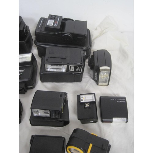 72 - A box of photographic flash guns