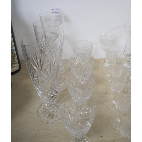 51 - Assorted glass drinking vessels. Lot includes three cut glass water glasses, four tot glasses, port ... 