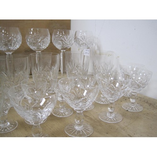 50 - Twenty-seven cut glass drinking vessels - lot comprises five long stemmed goblets, five water glasse... 