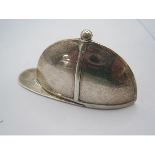 151 - An antique vesta case in the form of a Jockey's Cap, in good order, stamped for .925, approx weight ... 