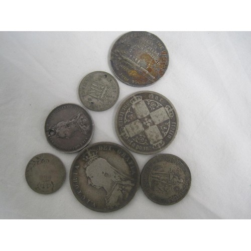 135 - An interesting assortment of coinage and medals/tokens including an 1888 double florin, a Victorian ... 