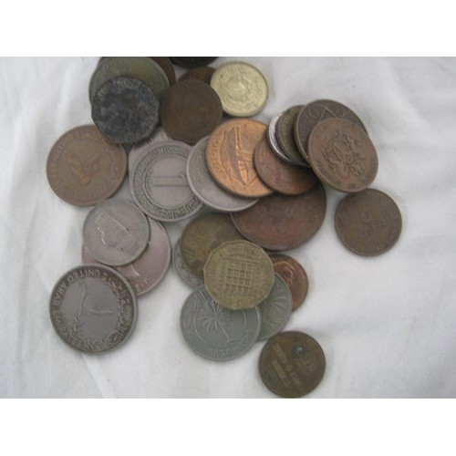 137 - An assortment of coinage contained in a broken and repaired piggy bank, includes some silver