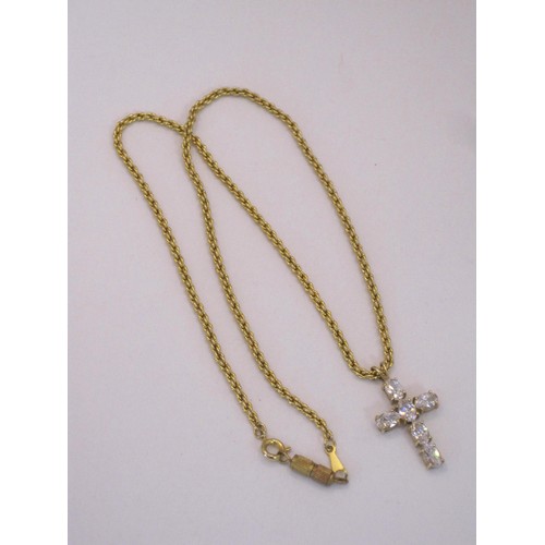 222 - A gold cross with white stones attached to a gold coloured chain.