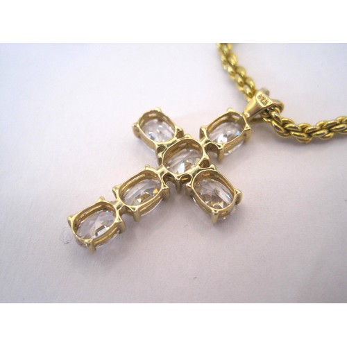 222 - A gold cross with white stones attached to a gold coloured chain.