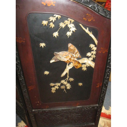 122 - A two-fold low screen, Chinese or Japanese, with applied work, ebonising and lacquer. A/f some losse... 