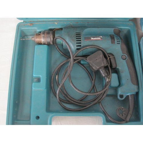 112 - Two Cased Makita Drills