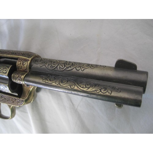 55 - A replica Colt Army with gold coloured finish in a tooled leather Western rig holster with belt, the... 