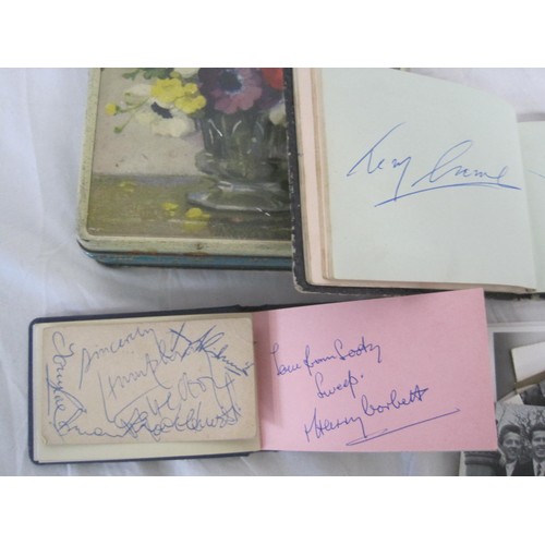 188 - A vintage tin containing a pair of autograph books and a number of signed lobby cards etc featuring ... 