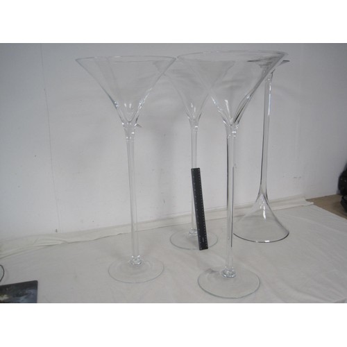 142 - 3 very large cocktail glasses on long stems, and a glass stand of similar size, ruler show for compa... 