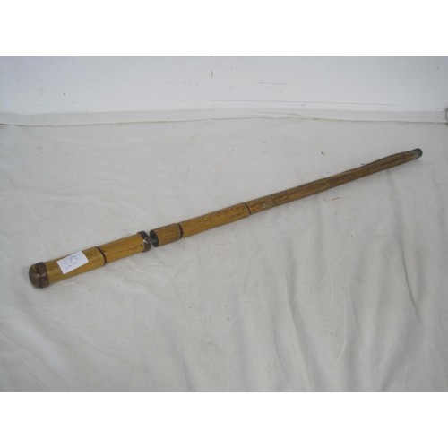 179 - An antique sword stick with bamboo shaft, the blade of good quality and egraved with floral decor an... 