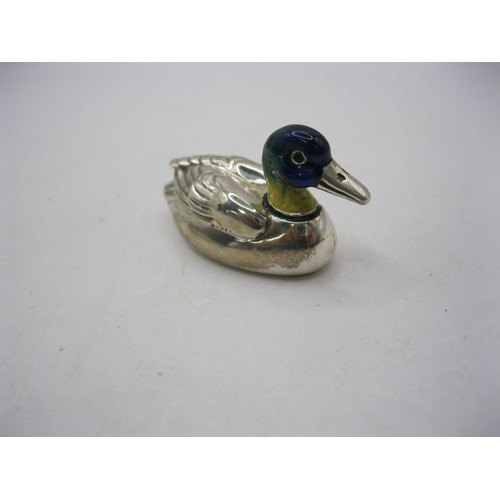 234 - A sterling silver duck with enamelled and coloured head, just over 1